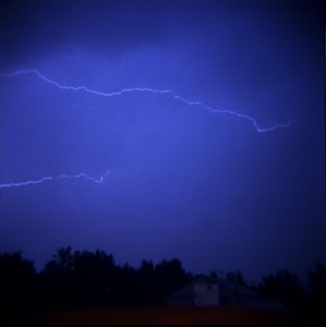 caption of flashes in a thunderstorm